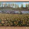 A painting of sunflowers in front of trees.