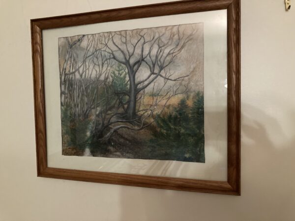 A painting of a tree in the middle of a room.